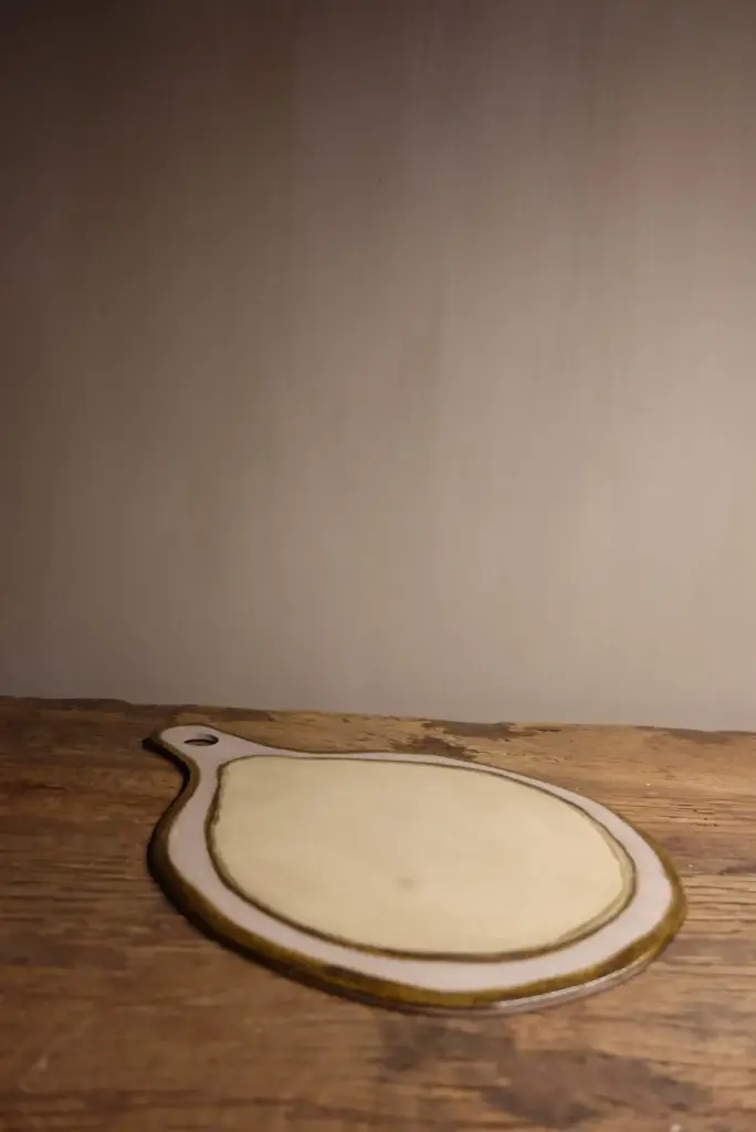 Ronde tapasplank met handvat (type 1)